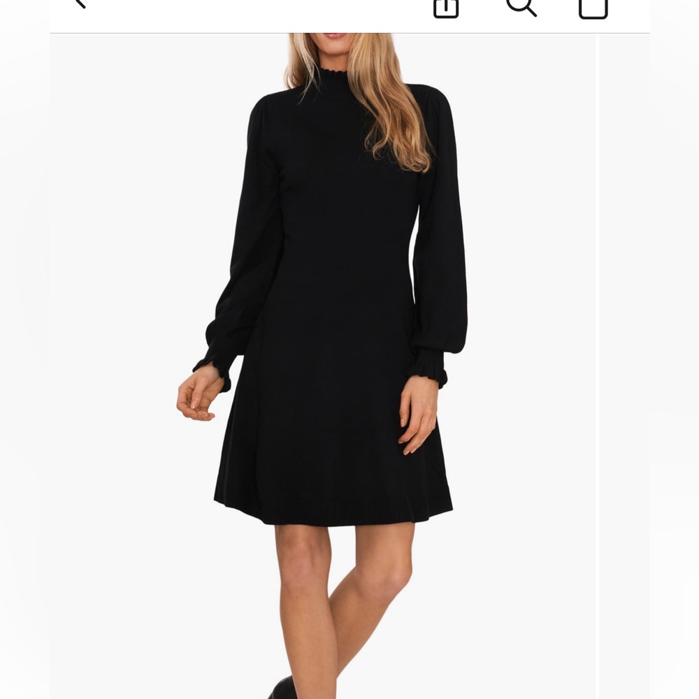 Mock neck long sleeve fit and flare sweater dress.